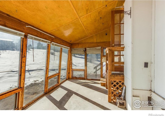 sunroom / solarium with lofted ceiling