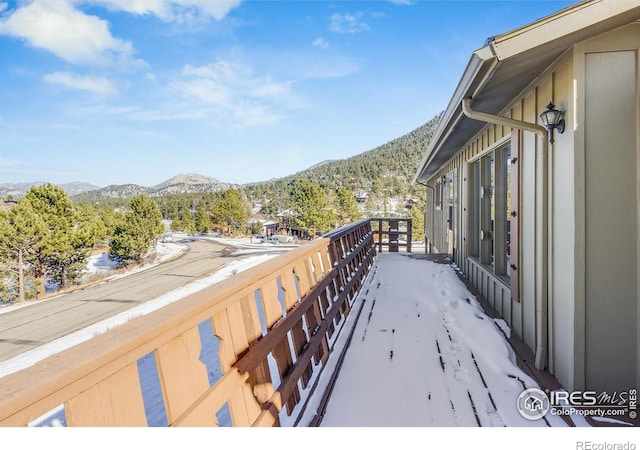 balcony featuring a mountain view