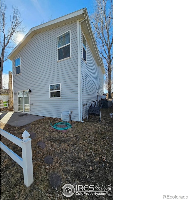 rear view of property with a patio