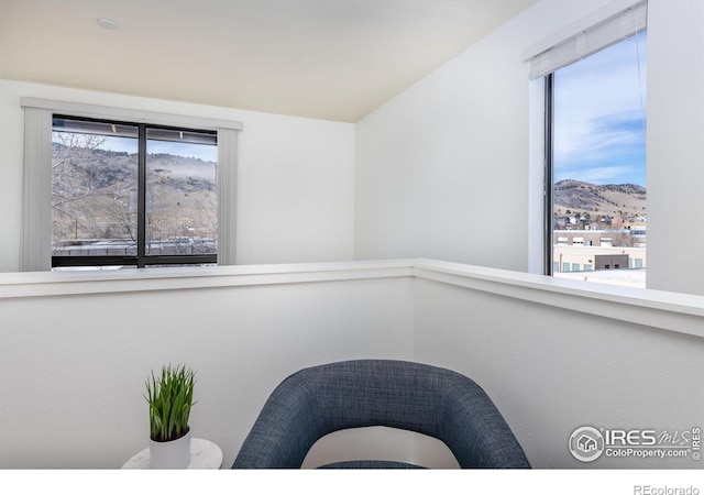 sitting room featuring a mountain view