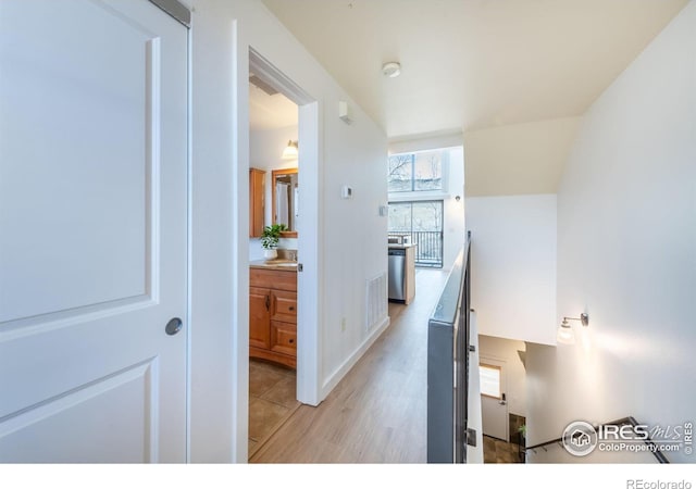 hall featuring light hardwood / wood-style flooring