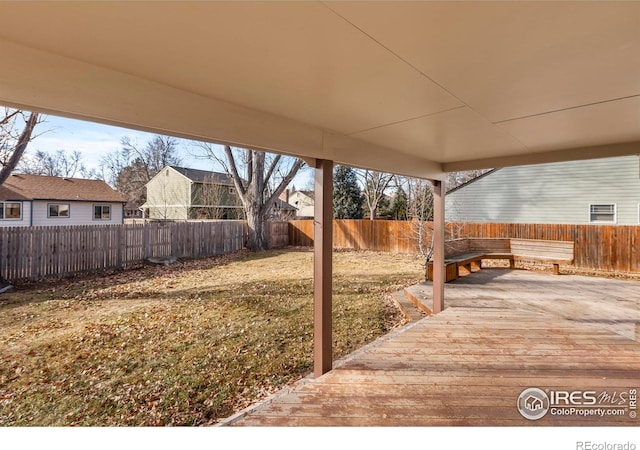 view of yard featuring a wooden deck