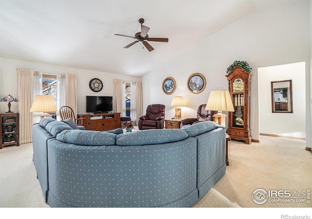 carpeted living room with lofted ceiling and ceiling fan