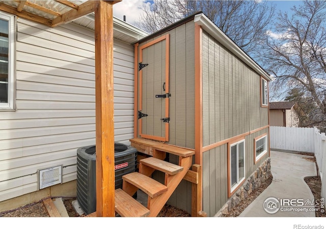 view of home's exterior featuring central AC unit