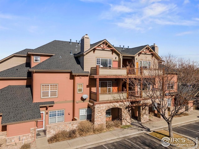 exterior space featuring a balcony