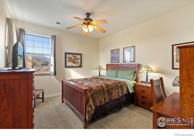 carpeted bedroom featuring ceiling fan