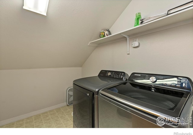 washroom featuring separate washer and dryer