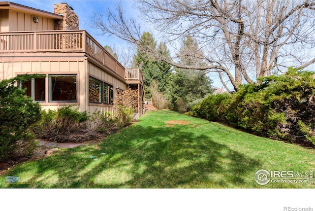 view of yard featuring a deck