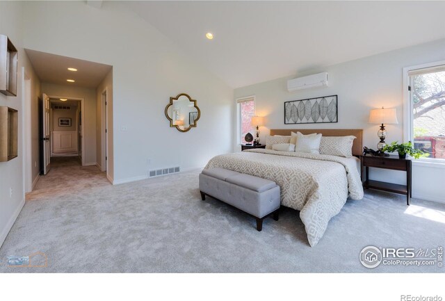 bedroom with light carpet, visible vents, an AC wall unit, high vaulted ceiling, and recessed lighting