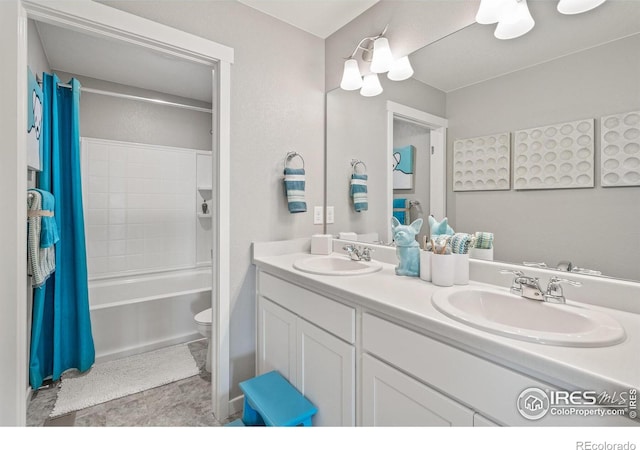 full bathroom with vanity, shower / bath combination with curtain, and toilet