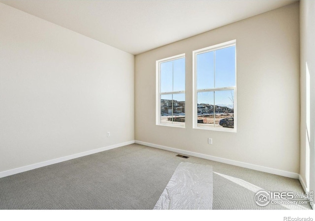 view of carpeted spare room