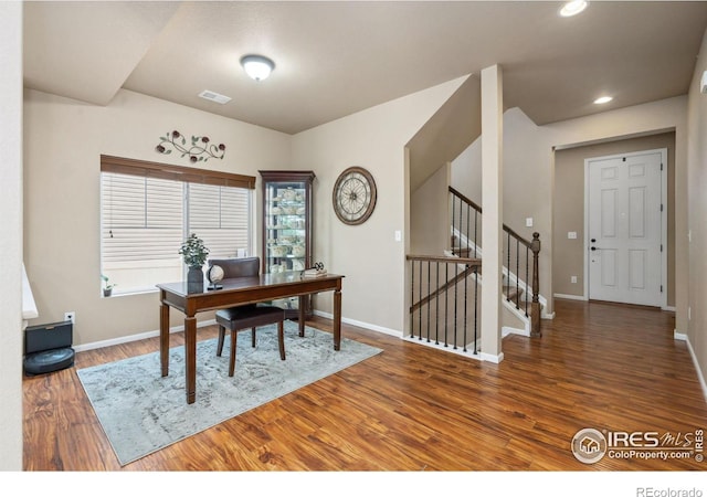 office area with dark hardwood / wood-style flooring