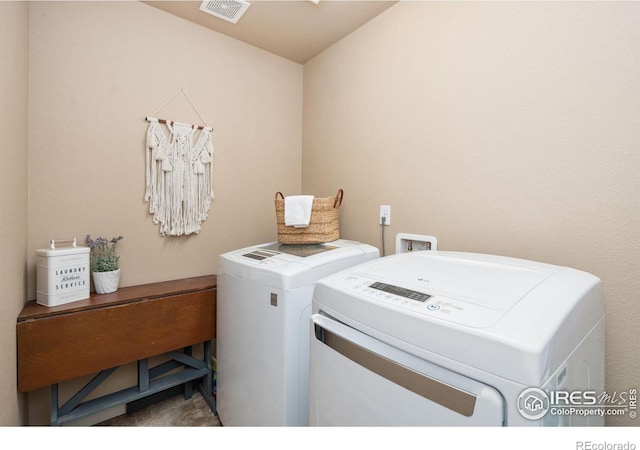 laundry area featuring washer and clothes dryer