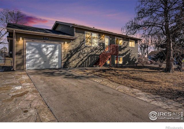 split level home featuring a garage