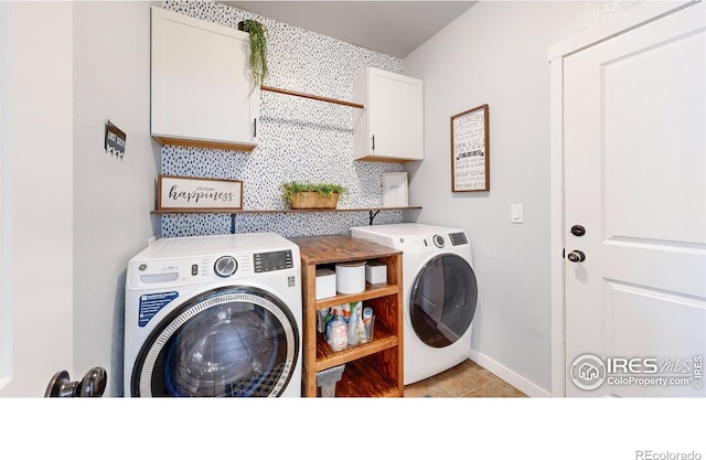 washroom with cabinets, light tile patterned floors, and independent washer and dryer