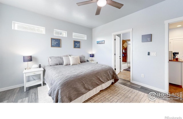 bedroom with hardwood / wood-style floors and ceiling fan