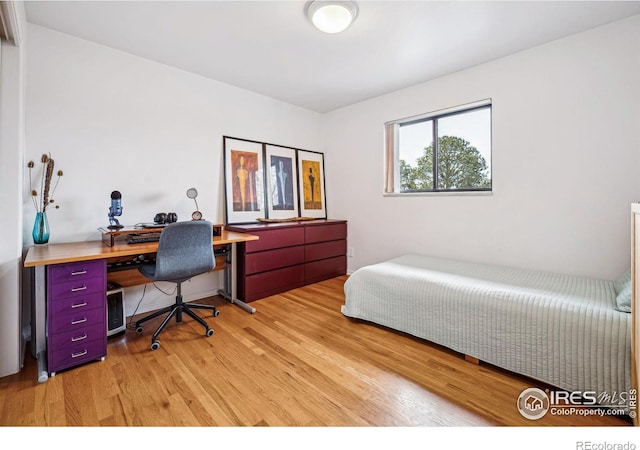 bedroom featuring light wood-type flooring