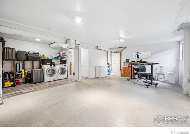 garage with separate washer and dryer