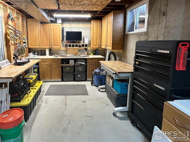 kitchen featuring butcher block countertops