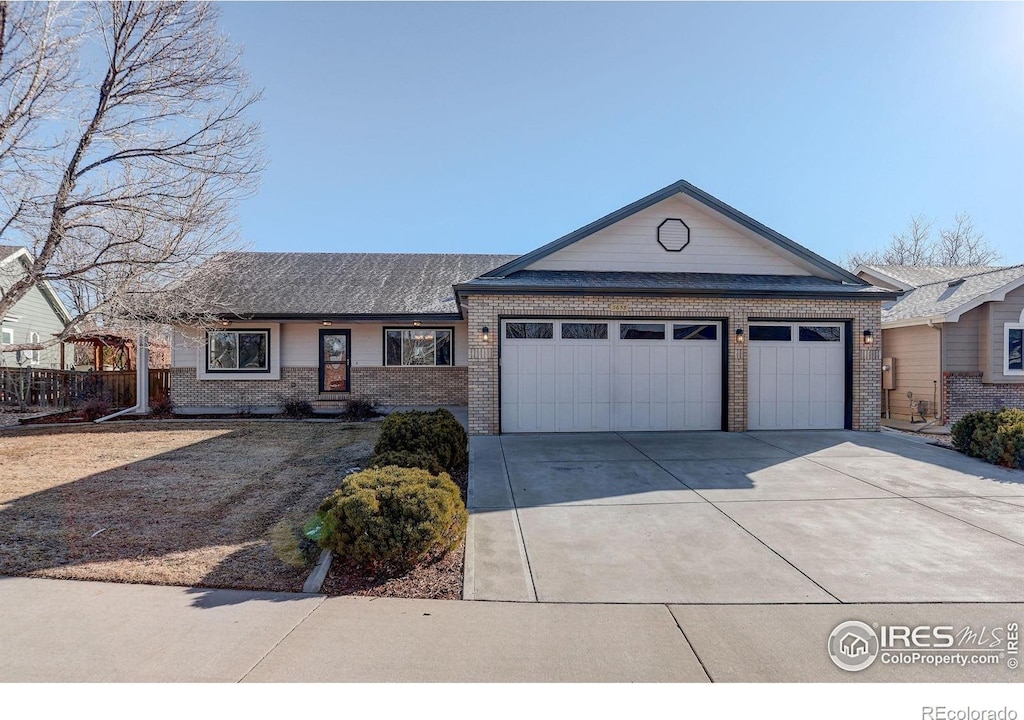 single story home featuring a garage