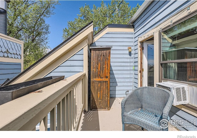 wooden deck featuring cooling unit