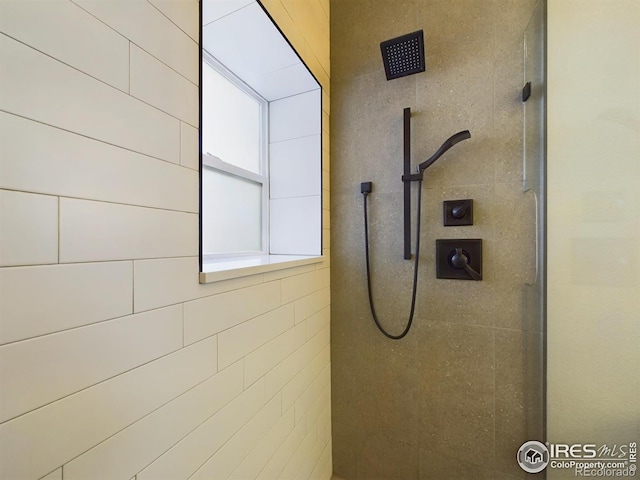 room details with a tile shower