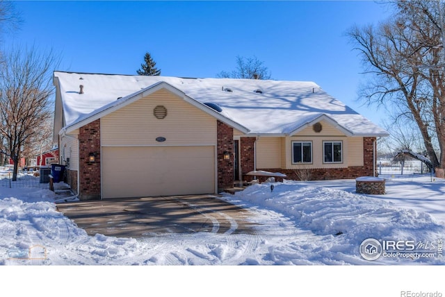 single story home with a garage