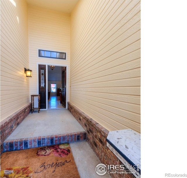 doorway to property with a patio area