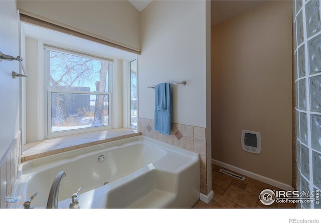 bathroom with a washtub