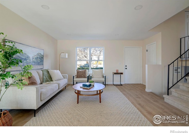 living room with light hardwood / wood-style floors