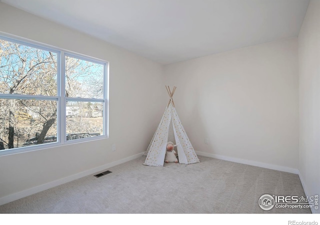 game room featuring carpet