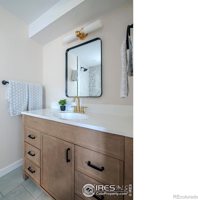 bathroom featuring vanity and tile patterned floors