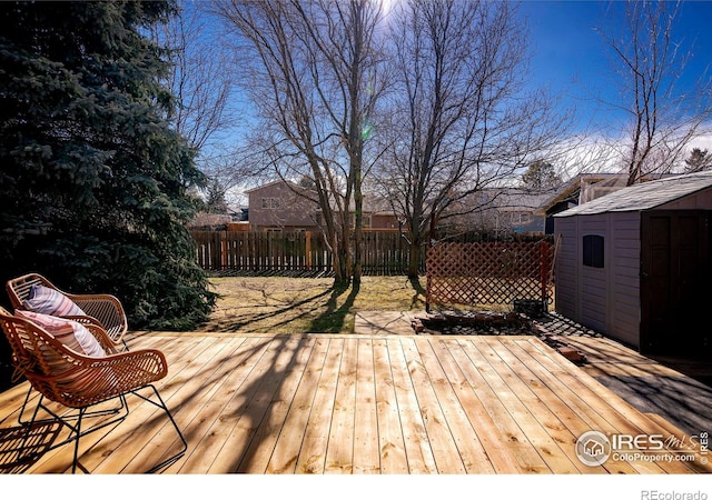 wooden deck with a storage unit