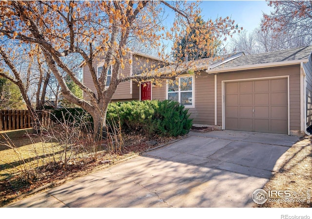 split level home featuring a garage