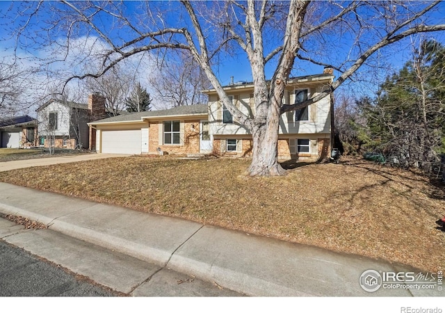 split level home with a garage