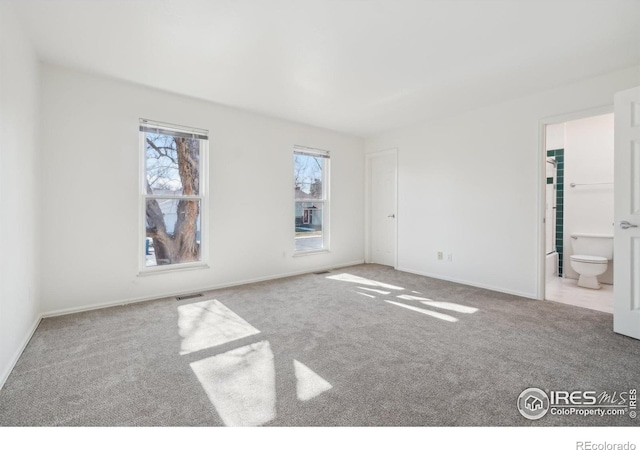 view of carpeted spare room