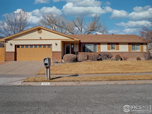 single story home with a garage and a front yard