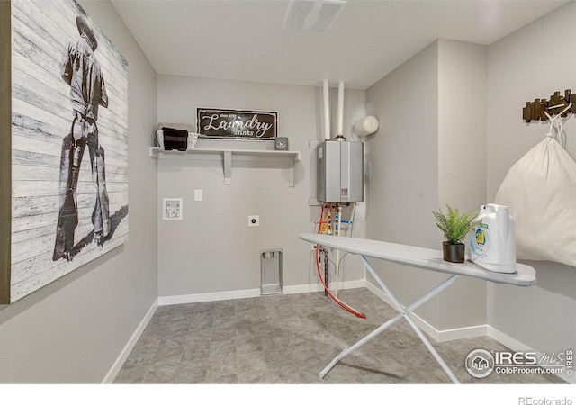 clothes washing area with electric dryer hookup and water heater