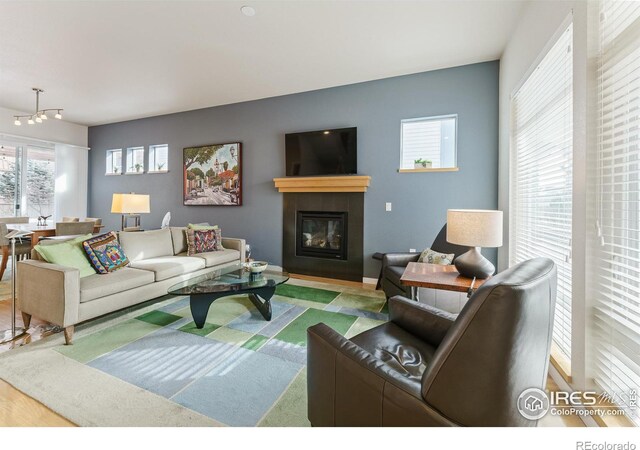 living room with a tiled fireplace