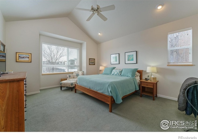 carpeted bedroom with ceiling fan and lofted ceiling