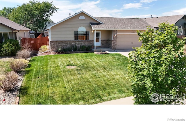 ranch-style house with a garage and a front yard