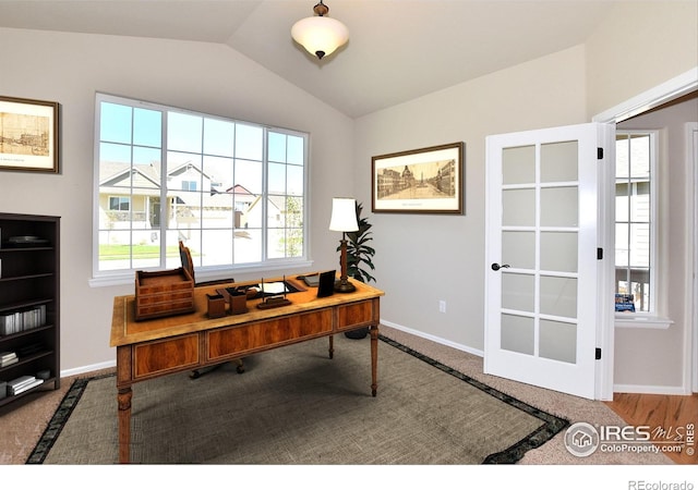 office space with lofted ceiling