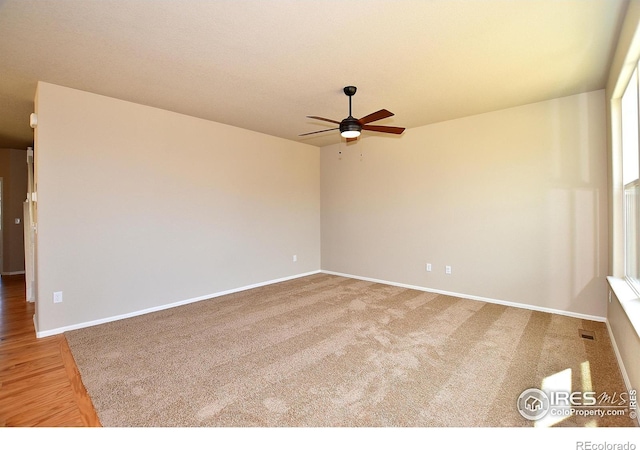 spare room featuring ceiling fan