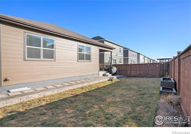 exterior space featuring a fenced backyard