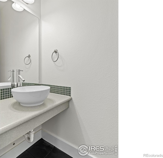 bathroom featuring sink and tile patterned floors