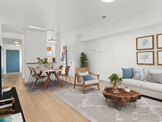 living room featuring light hardwood / wood-style floors