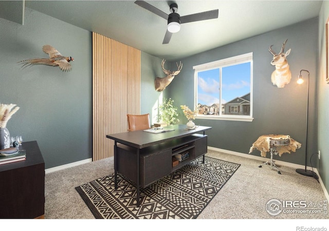 office with ceiling fan, baseboards, and carpet flooring