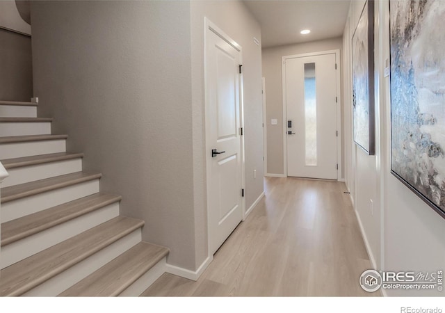 doorway to outside featuring light hardwood / wood-style flooring