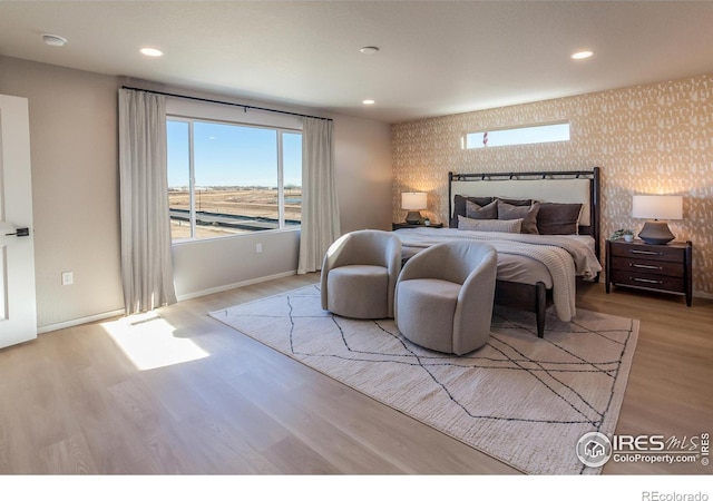 bedroom with light wood-type flooring