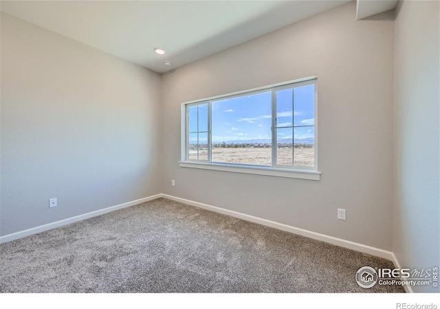 view of carpeted spare room